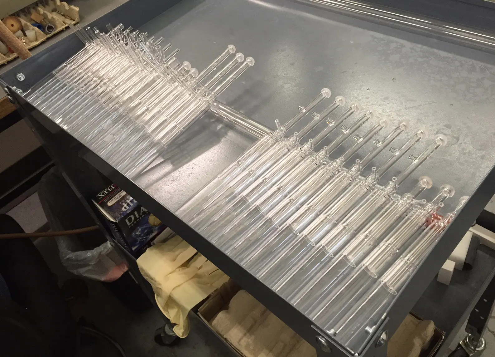 A large batch of repaired torches is ready to go back to the client.