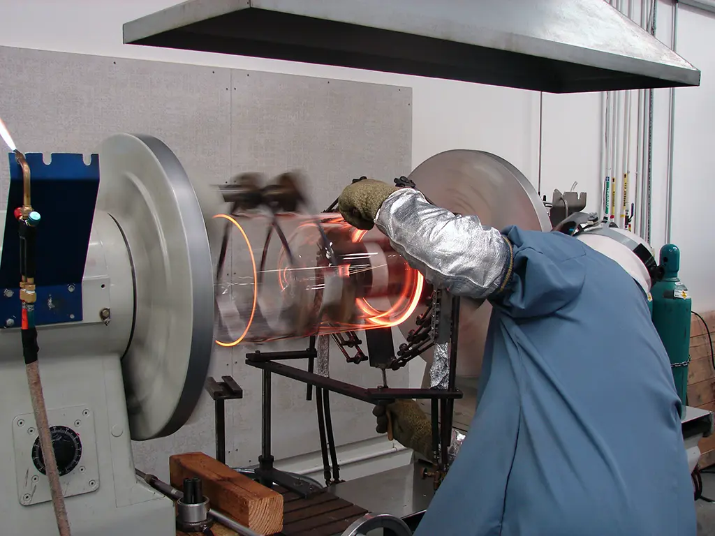 Lathe operator amazes onlookers by spinning fire