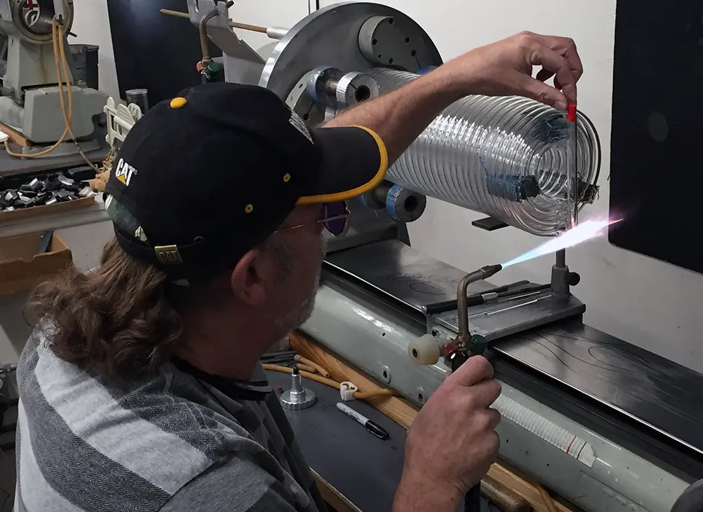 High-quality coils from Precision Glassblowing, come in a wide range of materials, sizes, and specifications. Whatever you require, whether borosilicate or quartz; 0.5 mm-20 mm ID tubing; or 5 mm-300 mm inner coil diameter, we have the expertise to satisfy your needs.